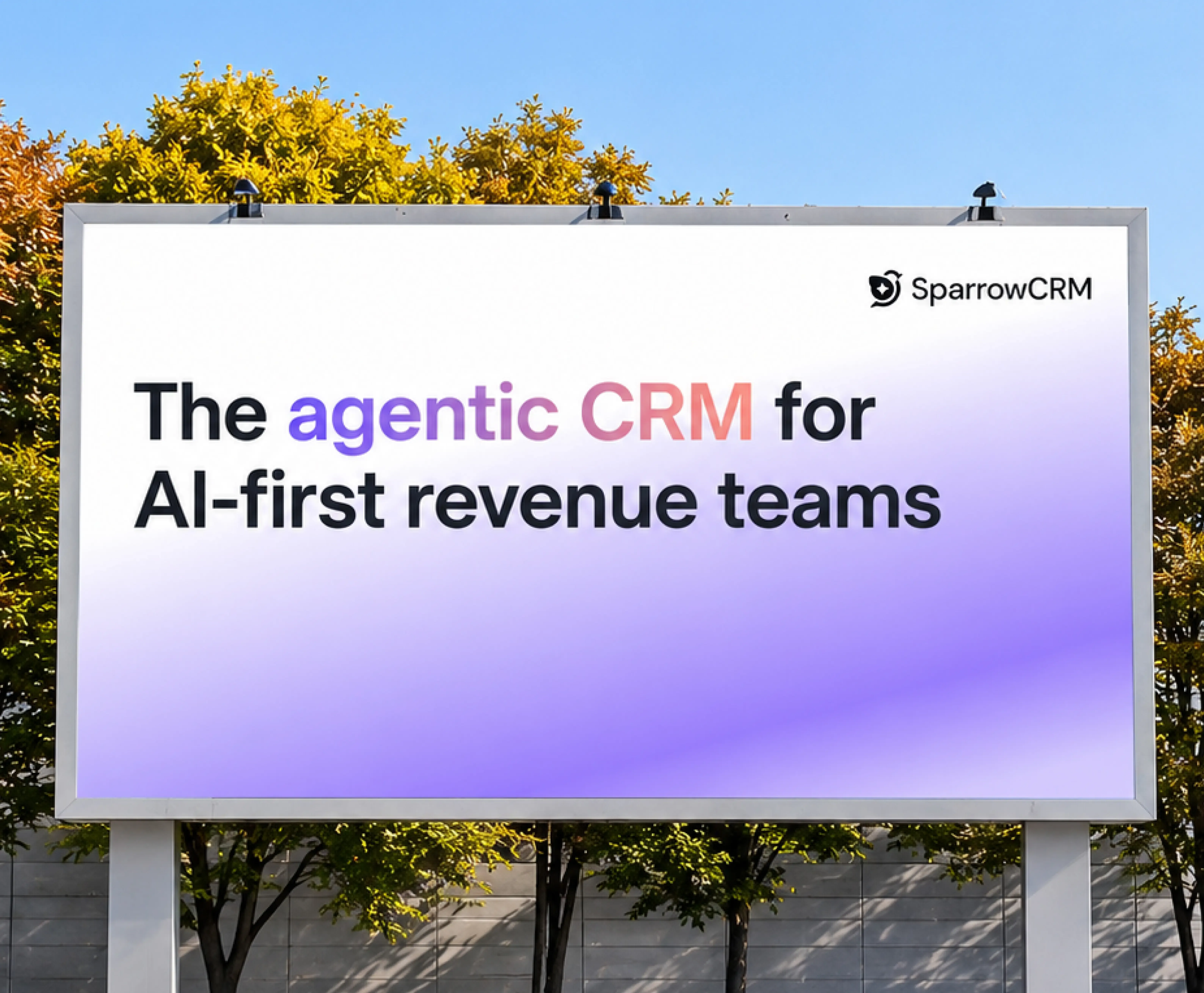 SparrowCRM billboard featuring the text “The agentic CRM for AI-first revenue teams” against a sunny outdoor background.